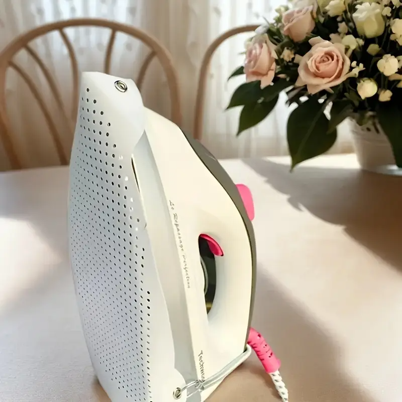 Iron heat protector used on dry iron for safe ironing
